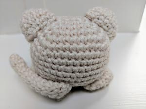 Sew the tail at back the body.