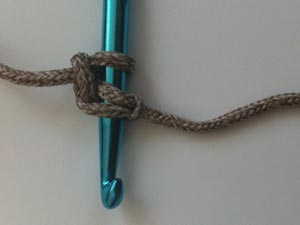 Insert hook into first chain stitch
